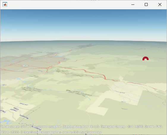 Red circular point plotted over terrain