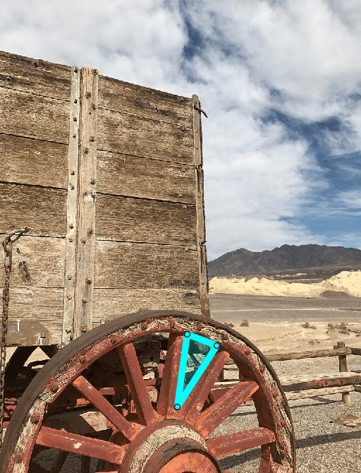 Cyan colored triangular ROI aligned with different spokes of the wagon wheel.