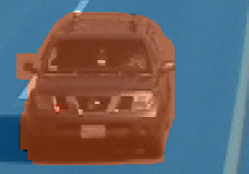 Highway scene with vehicle pixels in red and road pixels in blue