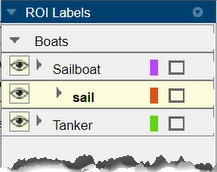 Two sublabels drawn around the sails of one sailboat in image.